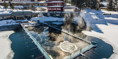Hotels am See - Restaurant - Kärnten - Schwimmen im 30°C warmen See-Bad im Winter - Hotel Hochschober