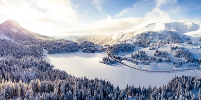 Hotels am See - Restaurant - Kärnten - Turracher Höhe mit Turracher See im Winter - Hotel Hochschober