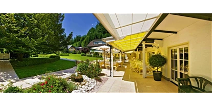 Hotels am See - Verpflegung: Frühstück - Hotel Seehof Mondsee Terrasse und Garten - Hotel Seehof Mondsee