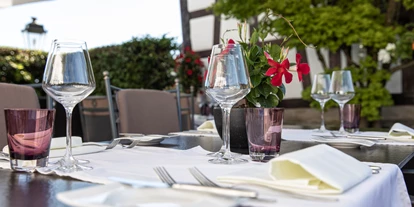 Hotels am See - Verpflegung: Frühstück - Gedeckter Tisch Terrasse - Hotel de Charme Römerhof