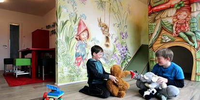 Hotels am See - Verpflegung: Frühstück - Spielzimmer im Spielehaus - Seehaus Winkler