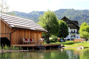 Urlaub am See: Badestrand mit Bootshütte - Seehaus Winkler