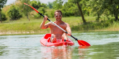 Hotels am See - Verpflegung: Frühstück - Kanu fahren am hauseigenen Badesee - VILA VITA Pannonia