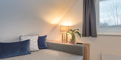 Hotels am See - Verpflegung: Frühstück - Bungalow B2 - Bett Galerie - VILA VITA Pannonia