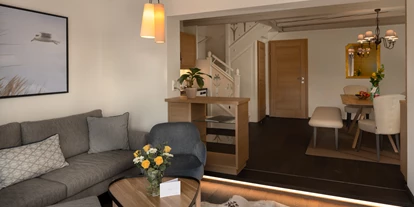 Hotels am See - Verpflegung: Frühstück - Bungalow B2 - Wohn- und Essbereich - VILA VITA Pannonia