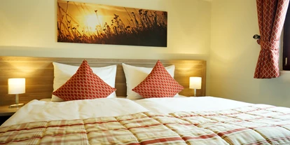 Hotels am See - Verpflegung: Frühstück - Bungalow B1 -  Schlafzimmer - VILA VITA Pannonia