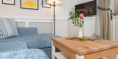 Hotels am See - Verpflegung: Frühstück - Bungalow A1 - Wohnzimmer - VILA VITA Pannonia