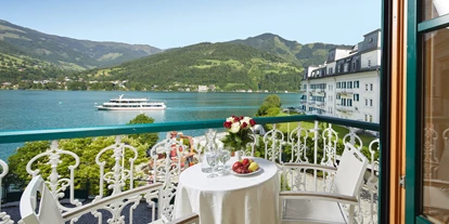 Hotels am See - Restaurant - Blick auf den See vom Komfort Doppelzimmer mit Seeblick & Balkon - GRAND HOTEL ZELL AM SEE