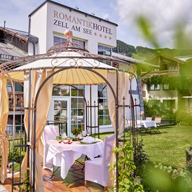 Urlaub am See: Paradiesgarten / Dachterrasse - RomantikHotel Zell Am See