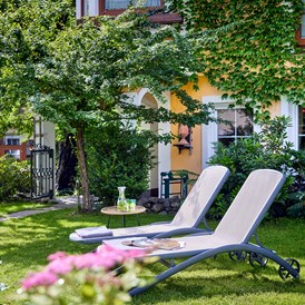 Urlaub am See: Garten / Rosengarten - RomantikHotel Zell Am See