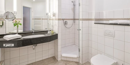 Hotels am See - Verpflegung: Frühstück - Badezimmer - Kurhaus am Inselsee