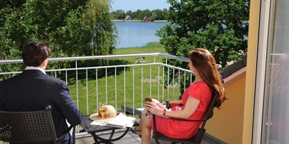 Hotels am See - Verpflegung: Frühstück - Zimmer Seeseite mit Balkon - Strandhaus am Inselsee