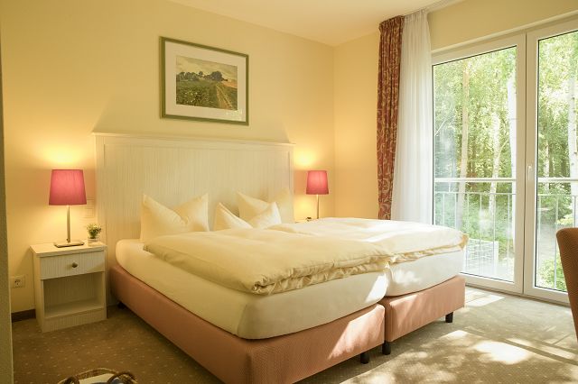 Urlaub am See: Zimmer Waldseite - Strandhaus am Inselsee