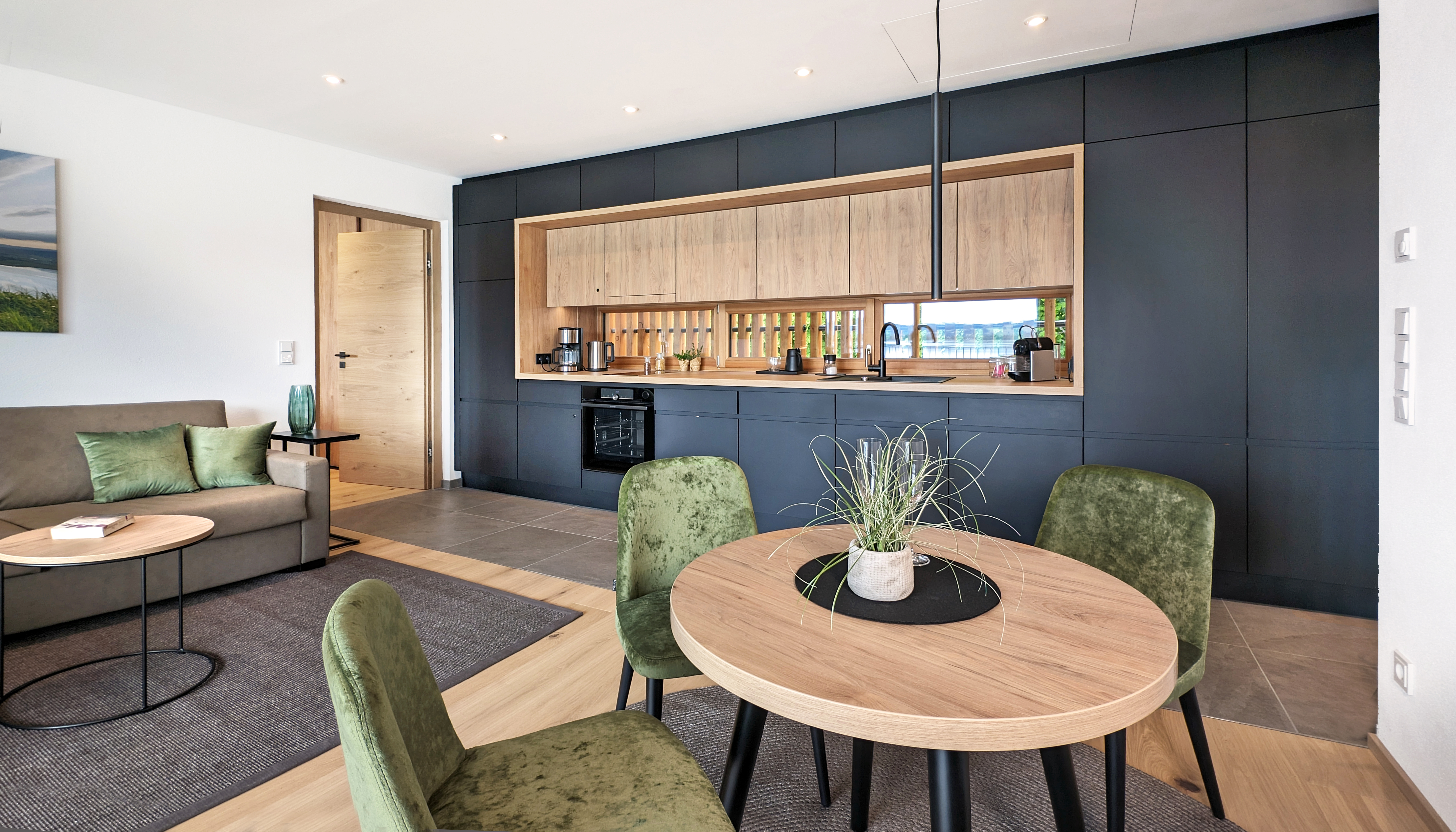 Urlaub am See: Wohnzimmer - Seehaus Apartments am Kochelsee