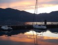 Urlaub am See: Sunset at Castelletto di Brenzone sul Garda - Hotel Danieli La Castellana